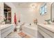 Elegant bathroom features dual vanities, a soaking tub, and modern fixtures at 5867 Rosewood Dr., Myrtle Beach, SC 29588