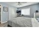 Bedroom featuring a bed, closet, TV, and desk, creating a cozy and functional space at 5867 Rosewood Dr., Myrtle Beach, SC 29588