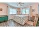 Cozy bedroom with natural light, featuring neutral tones and comfortable furnishings at 5867 Rosewood Dr., Myrtle Beach, SC 29588