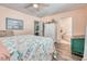Comfortable bedroom featuring a closet, a ceiling fan, and ensuite bathroom at 5867 Rosewood Dr., Myrtle Beach, SC 29588