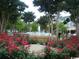 Beautiful rose garden surrounding a fountain, enhancing the appeal of the community's outdoor space at 5867 Rosewood Dr., Myrtle Beach, SC 29588