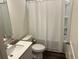 Clean bathroom with modern vanity, toilet, and shower/tub combo, featuring neutral tones at 606 Muster Field Ct., Conway, SC 29526