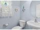 Simple and clean powder room with a pedestal sink and nautical decorations at 6095 Catalina Dr. # 616, North Myrtle Beach, SC 29582