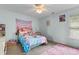 Charming bedroom with a colorful bed, playful decor, and plenty of natural light at 6095 Catalina Dr. # 616, North Myrtle Beach, SC 29582
