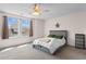 Bright bedroom featuring a comfortable bed and a ceiling fan for climate control at 6095 Catalina Dr. # 616, North Myrtle Beach, SC 29582