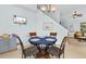 Inviting dining area with tile flooring, chandelier, and comfortable seating for enjoying meals at 6095 Catalina Dr. # 616, North Myrtle Beach, SC 29582