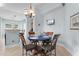 Cozy dining area featuring a stylish round table, seating for four, and a flatscreen television on the wall at 6095 Catalina Dr. # 616, North Myrtle Beach, SC 29582