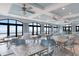 Bright dining room with multiple tables, chairs, and panoramic ocean views at 6095 Catalina Dr. # 616, North Myrtle Beach, SC 29582