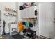 Organized garage area with storage cabinets, shelving, and a utility sink at 6095 Catalina Dr. # 616, North Myrtle Beach, SC 29582
