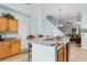 Bright kitchen featuring a breakfast bar, oak cabinetry, and easy access to living spaces at 6095 Catalina Dr. # 616, North Myrtle Beach, SC 29582