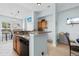 Bright kitchen with breakfast bar, oak cabinetry, and stainless steel dishwasher at 6095 Catalina Dr. # 616, North Myrtle Beach, SC 29582