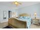 Serene main bedroom featuring a decorative bed frame, lamps, and calming light blue walls at 6095 Catalina Dr. # 616, North Myrtle Beach, SC 29582