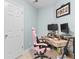 Functional home office space with a desk, monitor, and pink gaming chair at 6095 Catalina Dr. # 616, North Myrtle Beach, SC 29582