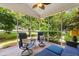 Serene screened porch with cozy seating, perfect for enjoying the outdoor view at 6095 Catalina Dr. # 616, North Myrtle Beach, SC 29582