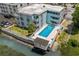 Aerial view of condos featuring outdoor pool and overlooking the waterway at 6301 N Ocean Blvd. # 2B, North Myrtle Beach, SC 29582