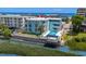 Aerial view of condo complex with a pool by the waterway and ocean nearby at 6301 N Ocean Blvd. # 2B, North Myrtle Beach, SC 29582