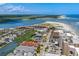 Aerial view of coastal neighborhood near beach, featuring waterway and beachfront condos at 6301 N Ocean Blvd. # 2B, North Myrtle Beach, SC 29582