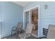 Outdoor patio featuring gray seating and views into the living area at 6301 N Ocean Blvd. # 2B, North Myrtle Beach, SC 29582