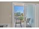 A view from the patio showing outdoor seating and views of the street and building at 6301 N Ocean Blvd. # 2B, North Myrtle Beach, SC 29582