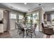 Inviting dining room with natural light, view, and room for six at 6430 Cascata Dr., Myrtle Beach, SC 29572