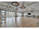 Spacious event room with hardwood floors and elegant chandeliers at 6430 Cascata Dr., Myrtle Beach, SC 29572