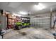 Spacious garage featuring storage, ample parking with a golf cart, and automatic doors at 6430 Cascata Dr., Myrtle Beach, SC 29572