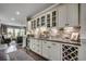 Modern kitchen with sleek countertops, wine rack, cabinetry, and stainless steel appliances at 6430 Cascata Dr., Myrtle Beach, SC 29572