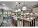 Spacious kitchen featuring a large island, stainless steel appliances, and an open layout at 6430 Cascata Dr., Myrtle Beach, SC 29572