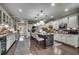 Expansive kitchen with large island, bar stool seating, and stainless steel appliances at 6430 Cascata Dr., Myrtle Beach, SC 29572
