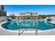 Resort-style pool with lounge chairs and a beautiful building backdrop at 6430 Cascata Dr., Myrtle Beach, SC 29572