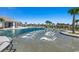 Stunning zero-entry pool with in-water loungers and palm trees at 6430 Cascata Dr., Myrtle Beach, SC 29572