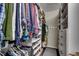 Organized walk-in closet with custom shelving, drawers, and plenty of storage space at 6430 Cascata Dr., Myrtle Beach, SC 29572