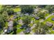 Aerial view of a residential area, highlighting lush greenery, serene ponds, and well-maintained homes at 6570 Pebble Beach Crescent, Myrtle Beach, SC 29588