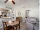 Inviting living area connected to the kitchen and hallway featuring comfortable furniture at 6570 Pebble Beach Crescent, Myrtle Beach, SC 29588