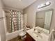 Neutral bathroom featuring a shower-tub combo and a neutral vanity with great lighting at 706 Jamie Ln., Conway, SC 29526