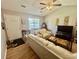 Cozy living room showcasing wood floors, neutral tones, and natural light at 706 Jamie Ln., Conway, SC 29526