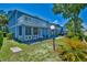 Relaxing backyard area with a patio, lush lawn, and manicured green plants at 832 Villa Dr. # 832, North Myrtle Beach, SC 29582