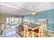 Spacious living and dining area combination with stylish furnishings and ample lighting at 832 Villa Dr. # 832, North Myrtle Beach, SC 29582