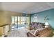 Relaxing living room with sliding glass doors and comfortable seating for entertaining at 832 Villa Dr. # 832, North Myrtle Beach, SC 29582