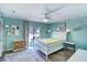 Serene main bedroom with balcony access, neutral tones, and stylish decor elements at 832 Villa Dr. # 832, North Myrtle Beach, SC 29582