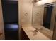 Bathroom featuring a vanity with a sink, mirror and shower area at 8488 Idlewood Dr., Myrtle Beach, SC 29588