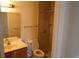 Bathroom featuring a vanity with a sink, toilet and shower area at 8488 Idlewood Dr., Myrtle Beach, SC 29588
