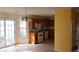 View of kitchen with light wood cabinets, standard appliances, sliding doors to backyard at 8488 Idlewood Dr., Myrtle Beach, SC 29588