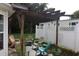 Outdoor patio area with pergola and multiple colorful chairs creates a comfortable outdoor living space at 8488 Idlewood Dr., Myrtle Beach, SC 29588