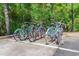 Various colored bicycles parked in a bike rack at 850 Fairway Dr. # 904Ee, Longs, SC 29568
