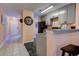 Well-lit kitchen featuring gray cabinets, granite countertops, and black appliances at 850 Fairway Dr. # 904Ee, Longs, SC 29568