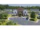 Aerial view showcasing the building with parking and a waterway at 8855 Radcliff Dr. Nw # 50B, Calabash, NC 28467