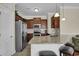 Modern kitchen featuring stainless steel appliances, granite countertops, and breakfast bar seating at 8855 Radcliff Dr. Nw # 50B, Calabash, NC 28467