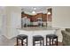 Well-equipped kitchen with stainless steel appliances, breakfast bar, and stylish pendant lighting at 8855 Radcliff Dr. Nw # 50B, Calabash, NC 28467