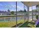 Relaxing screened porch with a view of the waterway at 8855 Radcliff Dr. Nw # 50B, Calabash, NC 28467